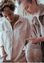 2 Women Molding a Clay
